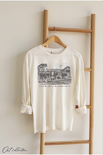 HE OWNS THE CATTLE ON A MINERAL WASHED LONG SLEEVE GRAPHIC
